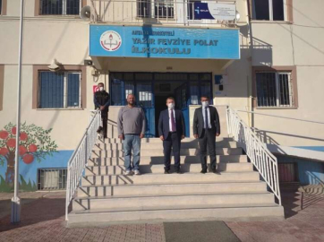  Kaymakam Çimşit, yıkım kararı çıkan okulu inceledi 