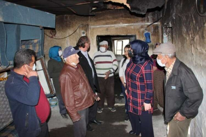  YAPILMIŞEV VE EKİBİNDEN YANGINZEDE AİLEYE ZİYARET